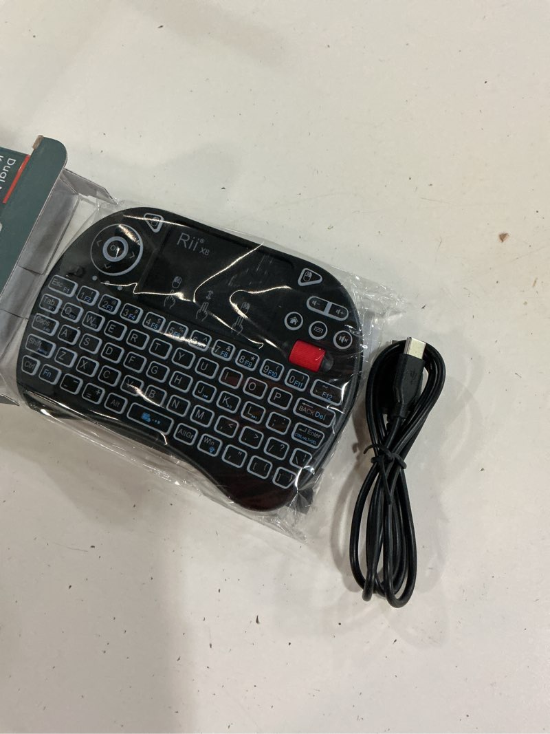 Condition photo showing New/Like New for rii x8 mini keyboard,upgrade 2.4ghz wireless and bluetooth keyboard with touchpad,rgb backlit,rechargeable battery for android tv box/mac/pc/nvidia shield(2.4g+bt version)
