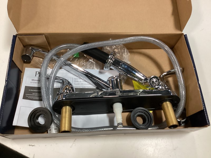 Condition photo showing As Is for project source dover chrome double handle deck-mount kitchen faucet (includes deck plate) (includes side sprayer)