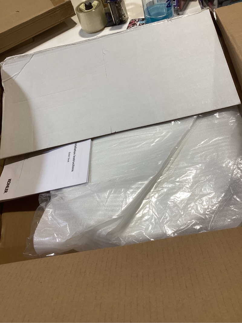 Condition photo showing As Is for kohler purewash m250 manual round bidet toilet seat, white, quiet-close lid prevents slamming, easy installation with quick-release hinges, adjustable spray position & pressure white round