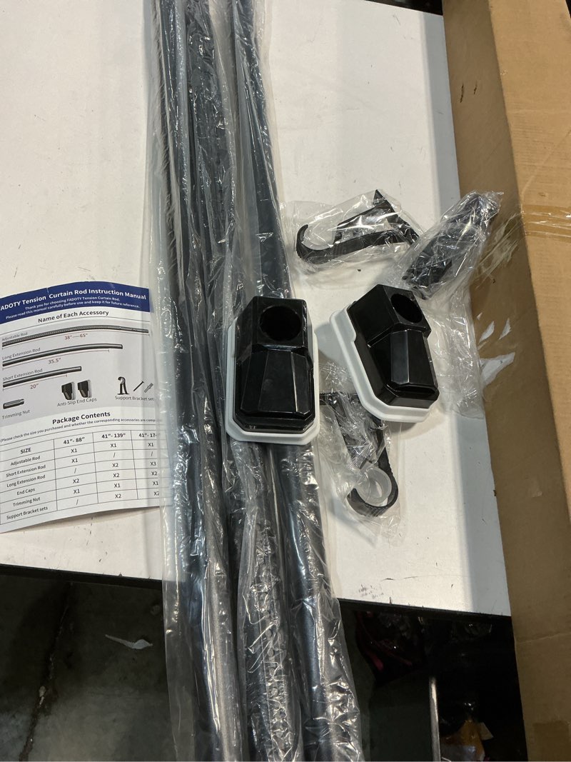 Condition photo showing New/Like New for FADOTY Tension Curtain Rod (unknown size)