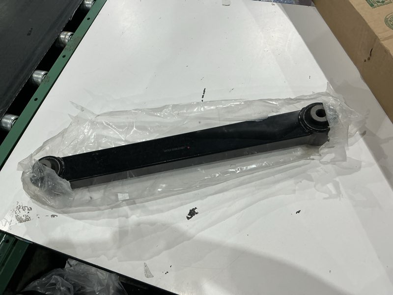 Condition photo showing As Is for dorman ….rear lower suspension control arm…