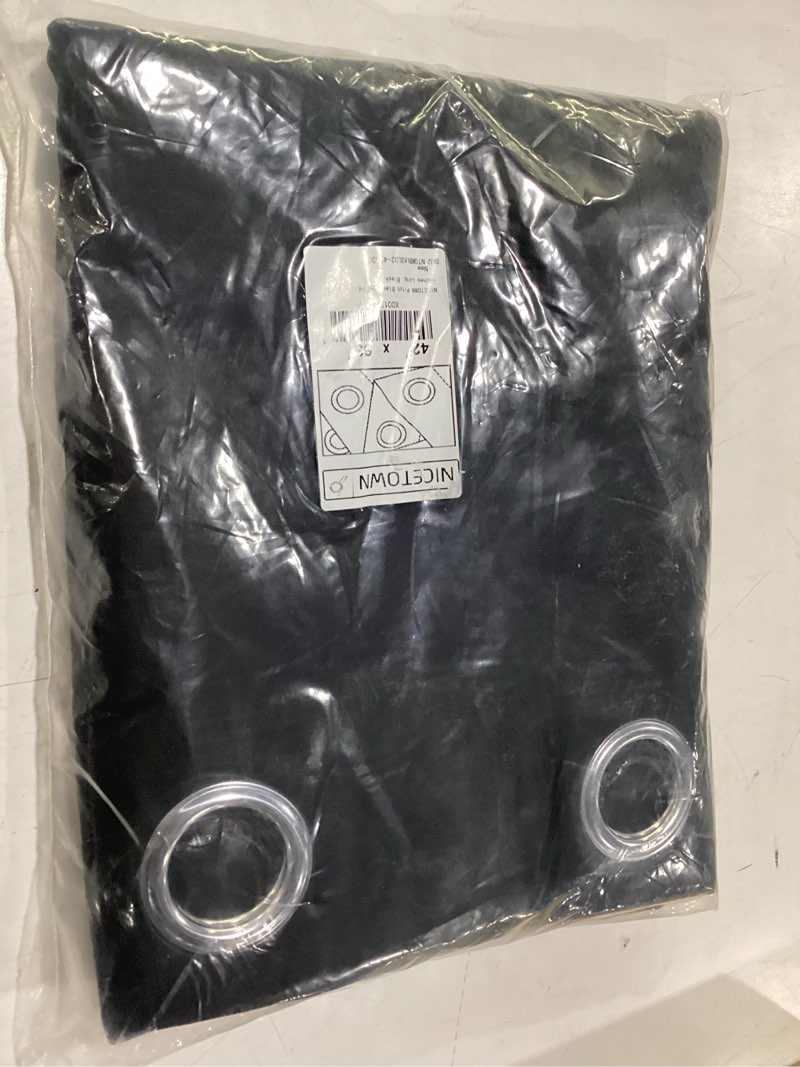 Condition photo showing New/Like New for nicetown halloween pitch black solid thermal insulated grommet blackout curtains/drapes for bedroom window (2 panels, 42 inches wide by 63 inches long, black) black 42"w x 63"l (pack of 2)