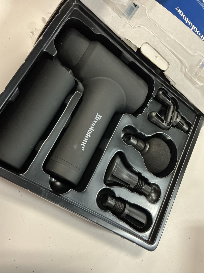Condition photo showing As Is for brookstone deep tissue massage gun for pain relief & muscle recovery – 9-speed handheld percussion massager, 4 heads, type-c rechargeable, quiet, 3200 rpm, shockproof design