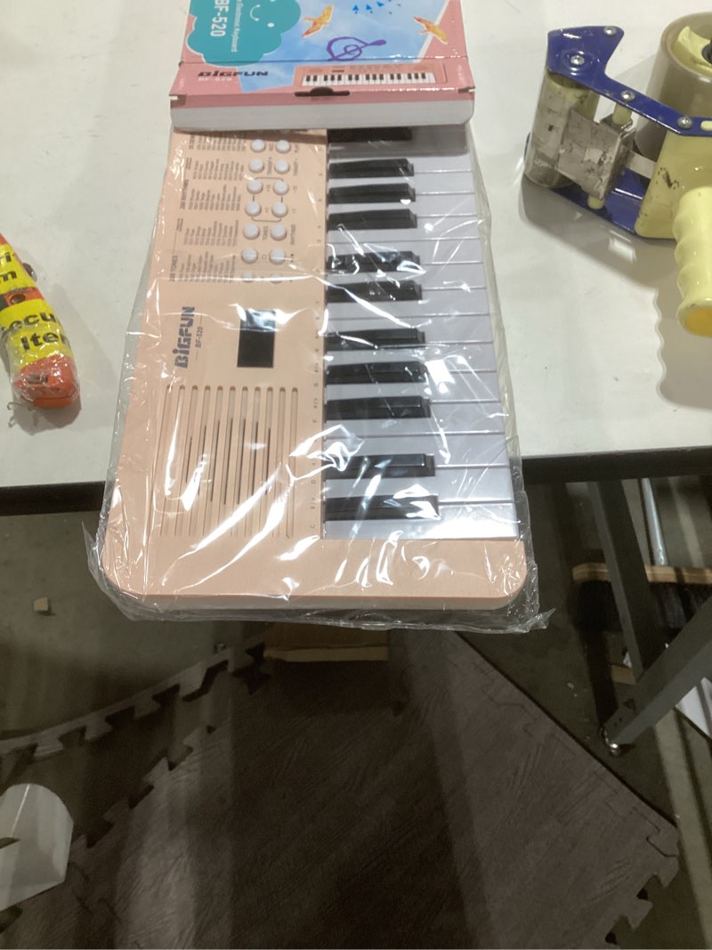 Condition photo showing As Is for Raimy Kids Keyboard Piano with Two Speakers, 37 Keys Electric Music Instruments Piano Keyboard with Mic, Early Education Music Toddlers Children Toys Gifts for 3 4 5 6 7 8 9 10 11 12 Years Old Girls