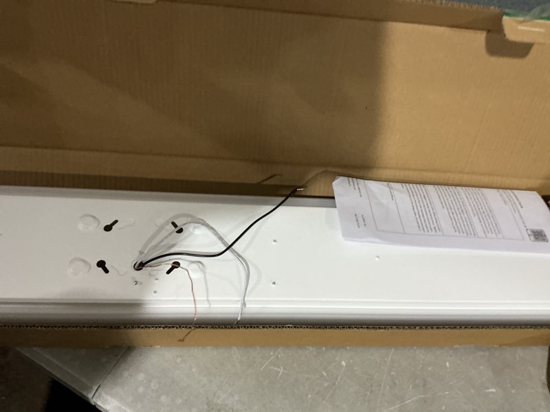 Condition photo showing As Is for possibly used 4ft 5.7\"w led wraparound light, 40w, 4400lm, 4000k, [2-lamp 32w fluorescent equiv.], hardwired, 4 foot led wrap light flush mount office ceiling light fixture for garage, office, kitchen, etl 4000k - 40w