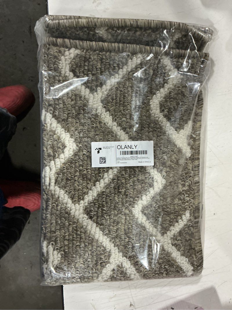 Condition photo showing New/Like New for olanly front door mat, non-slip rubber backing, dirt resistant and absorbent, washable, easy to clean low-profile indoor doormat for back door, entryway, inside entrance, 32x20, khaki khaki herringbone brick 32" x 20"