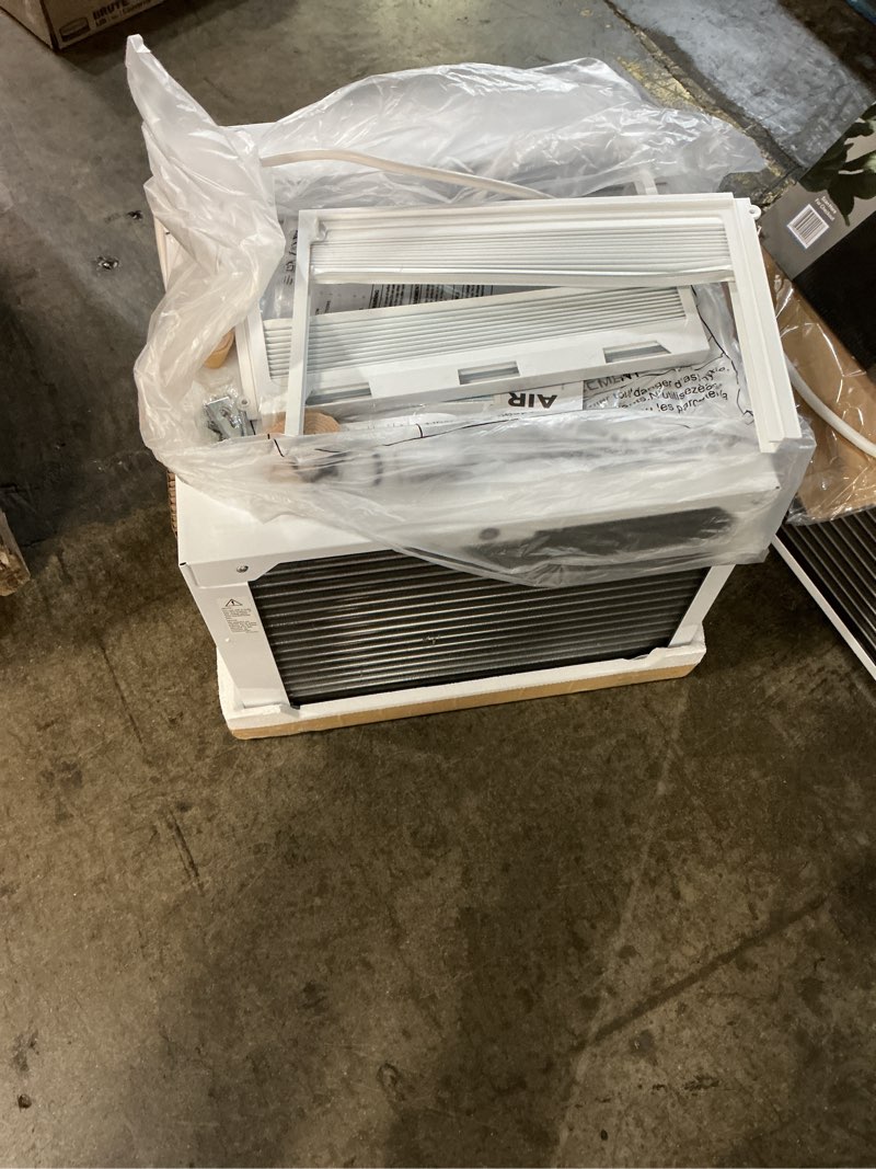 Condition photo showing As Is for 10,000btu 115-volts smart window air conditioner for 450 sq. ft. in white with wi-fi and remote