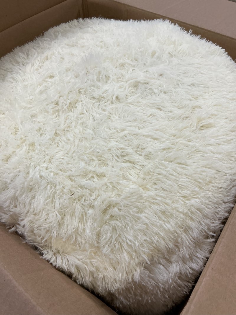 Condition photo showing As Is for HIGOGOGO Round Stuffed Pouf Ottoman, Long Faux Fur Poufs with Foam Chunk Filling, Fluffy and Furry Pouf Foot Stool Storage Ottoman, 20 X 15 Floor Poufs Foot Rest for Living Room, Beige 20INCH Beige