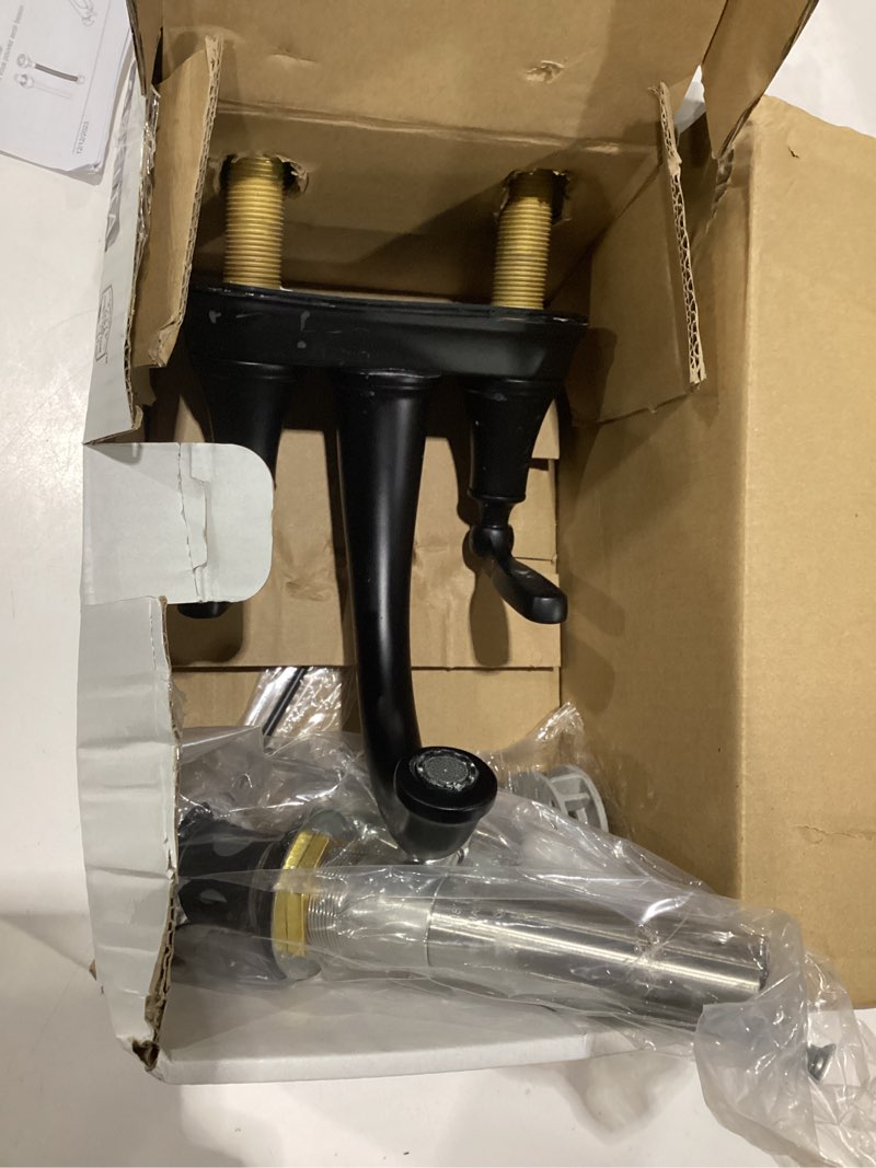 Condition photo showing As Is for delta faucet woodhurst centerset bathroom faucet, black 2-handle bathroom faucet, delta bathroom sink faucet, metal push-pop drain assembly, matte black 2532lf-blmpu