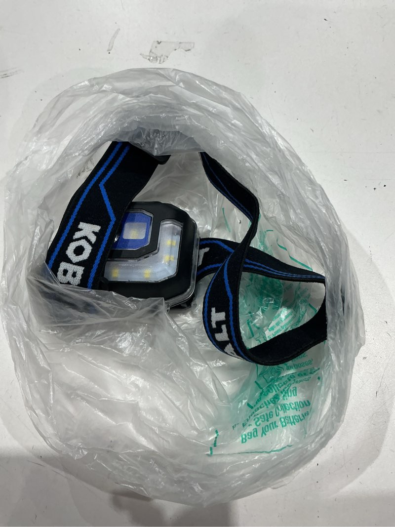 Condition photo showing As Is for k.balt 850-lumen 6 -mode led rechargeable headlamp