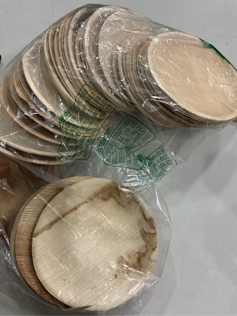 Condition photo showing As Is for palm leaf plates