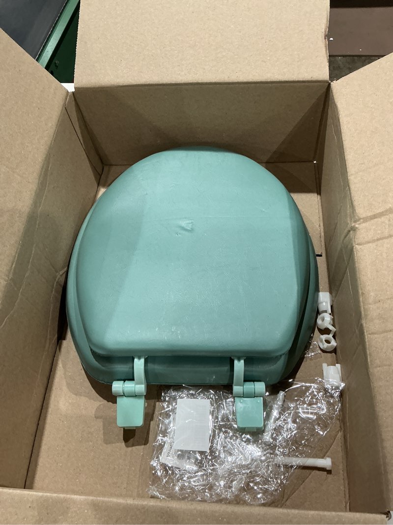 Condition photo showing Good Condition for soft standard vinyl toilet seat, light green - 17 inch soft vinyl cover with comfort foam cushioning - fits all standard size fixtures - easy to install fantasia by achim home decor light green 17 inch vinyl