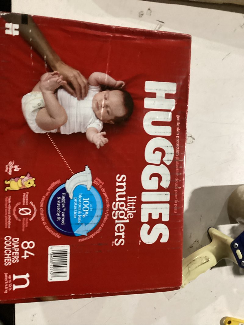 Condition photo showing As Is for huggies size newborn diapers, little snugglers baby diapers, size newborn (up to 10 lbs), 84 count, packaging may vary newborn 84