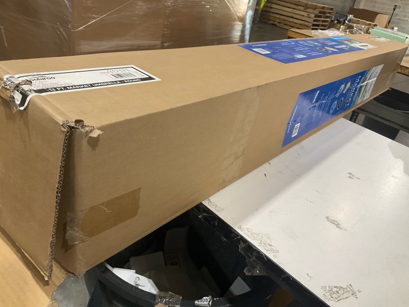 Condition photo showing As Is for gale pacific coolaroo 90percent uv block 2 position adjustable tilt umbrella, 10' round, smoke, 317171