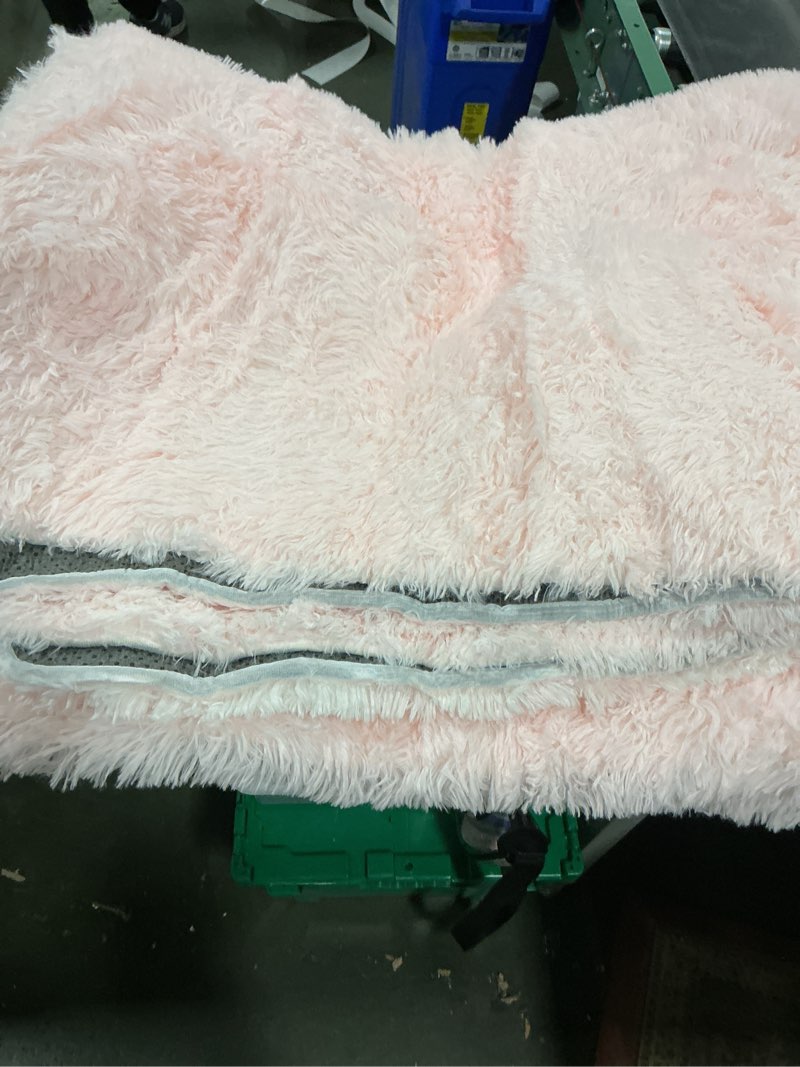 Condition photo showing As Is for Ultra soft area rug 5’ x 7’, pink