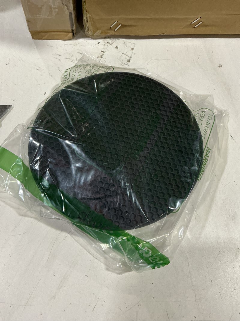 Condition photo showing New/Like New for homEdge Silicone Round Trivets, 6 Pack Heat Resistant Non Slip Pot Holders-Black, 7x0.24x7 inches, Food Grade Silicone, Honeycomb Surface Design, Dishwasher Safe, Multipurpose Kitchen Utensil