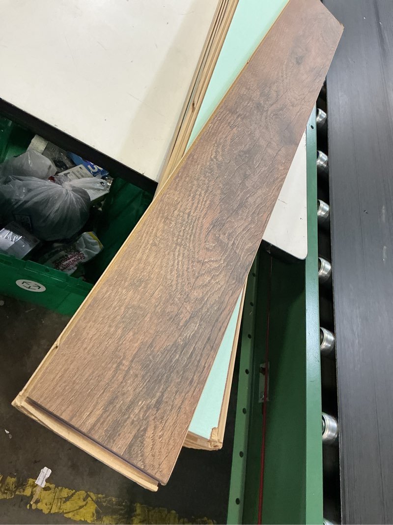 Condition photo showing As Is for select surfaces sclmf0486 barnwood spill defense laminate flooring