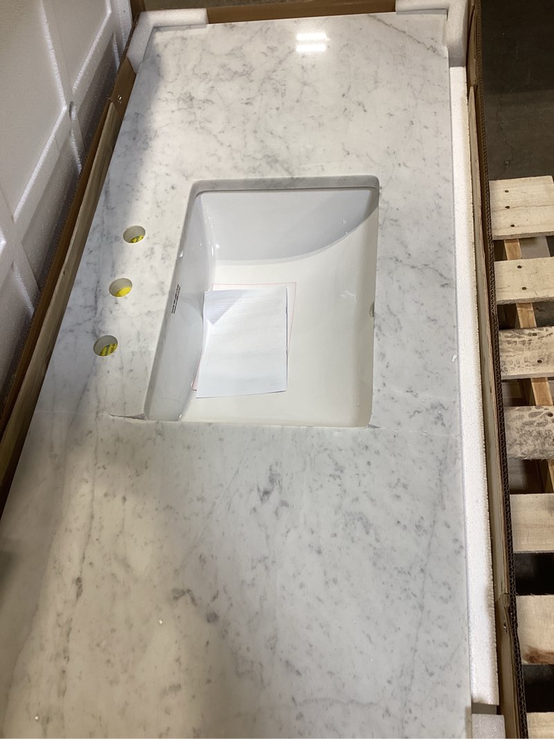 Condition photo showing As Is for allen + roth Natural Carrara 49-in x 22-in White Natural Marble Undermount Single Sink