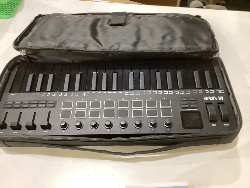 Condition photo showing Good Condition for similar to stock photom-vave smk37 pro black midi keyboard controller with 16 backlit drum pads, perfect for music production and beat making with responsive touch sensitivity