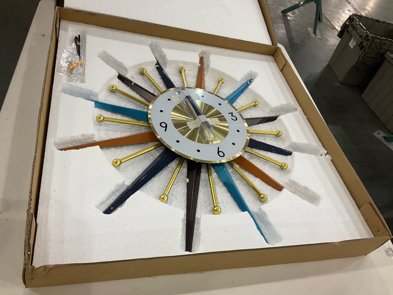 Condition photo showing New/Like New for FIELDY Large Wall Clock 22 Inch Mid Century Wall Clocks Starburst Clock Non Ticking Battery Operated 3D Wall Clocks Home Décor for Living Room, Kitchen, Dining Room, Bedroom Normal