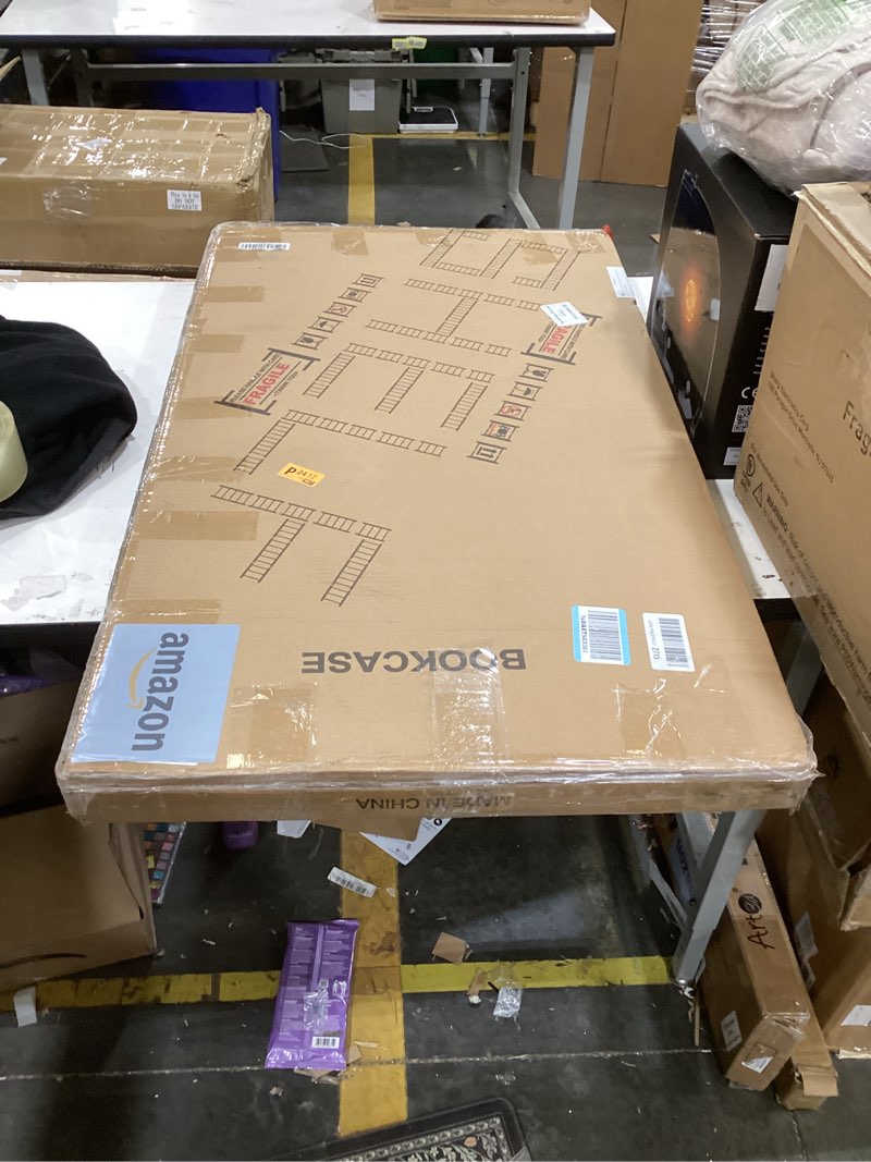 Condition photo showing Good Condition for this item is a packaged amazon bookcase.  