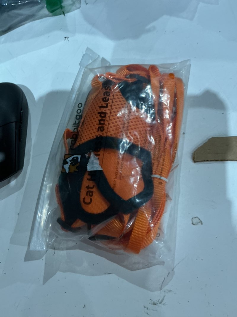 Condition photo showing Good Condition for rabbitgoo cat harness and leash for walking, escape proof soft adjustable vest harnesses for cats, easy control breathable reflective strips jacket, orange, s s orange