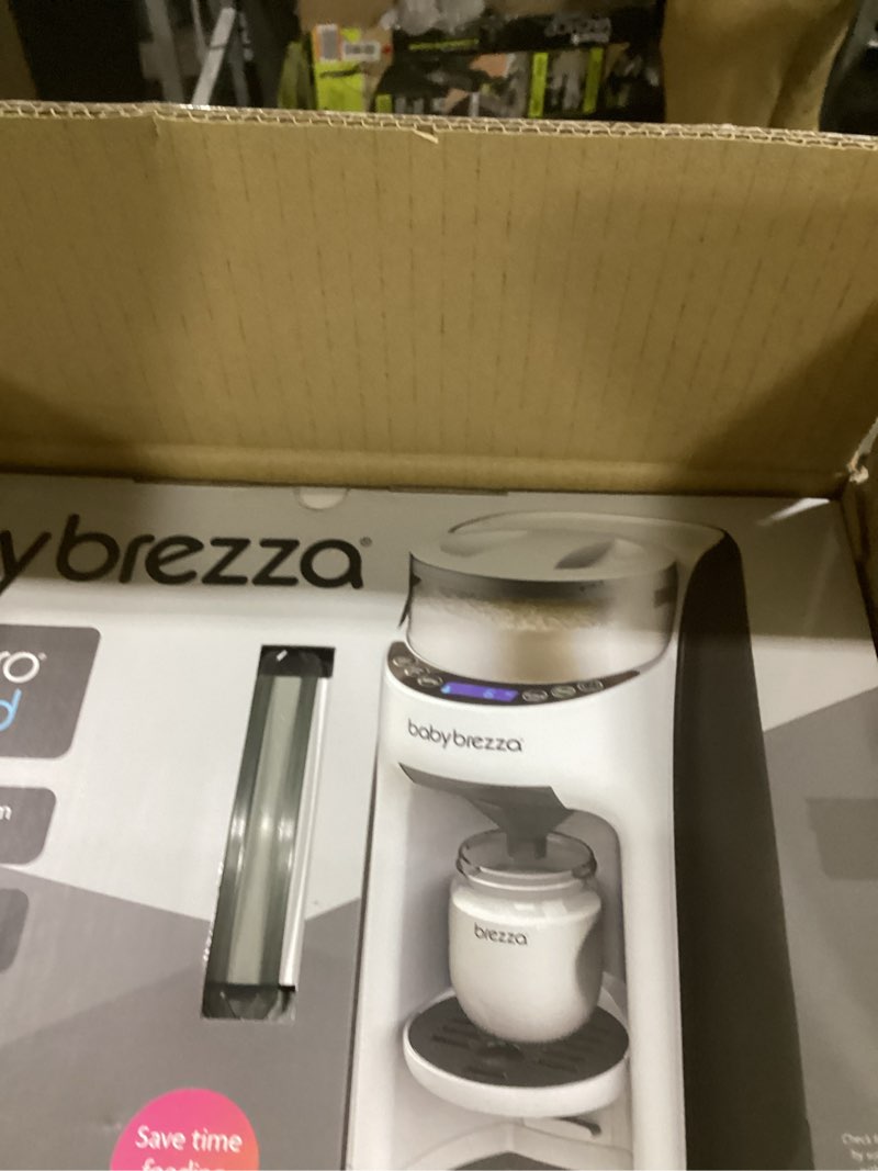 Condition photo showing New/Like New for baby brezza new and improved formula pro advanced formula dispenser machine - automatically mix a warm formula bottle instantly - easily make bottle with automatic powder blending, white