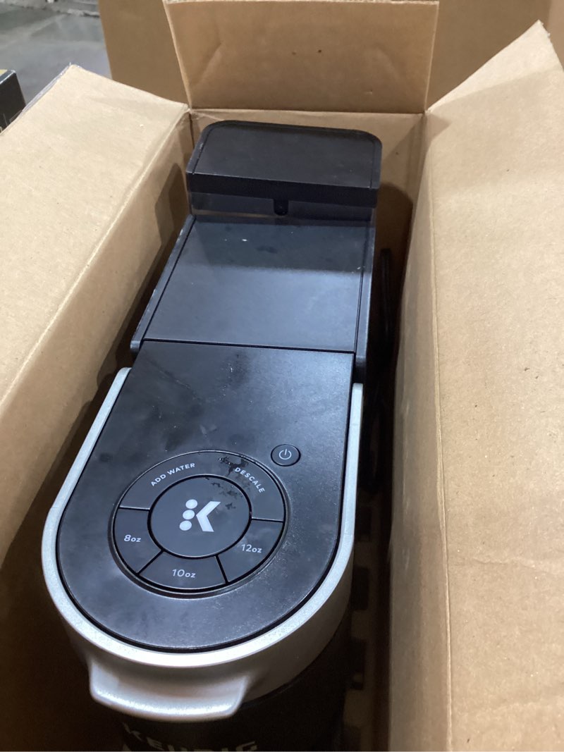 Condition photo showing As Is for keurig k-slim single serve k-cup pod coffee maker, multistream technology, 3 brew sizes, slim and sleek design, 46oz removable reservoir, black