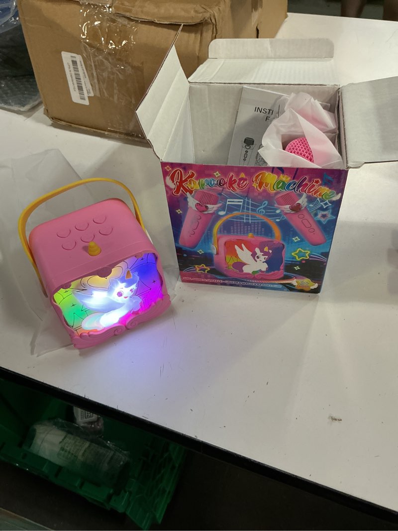 Condition photo showing New/Like New for unicorn karaoke machine with wings & castle lights,2 gem microphones&5 magic voice,mini bluetooth speaker,princess toys gifts for 3 4 5 6 7 8 9 10 11 12 year old girls age 3-12 easter basket stuffers