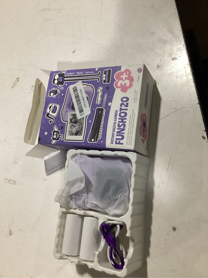 Condition photo showing As Is for instant print camera for kids, christmas birthday gifts for girls boys age 3-12, typonos kids cameras, portable toy camera for 3 4 5 6 7 8 9 10 year old girl with 32gb sd card, purple