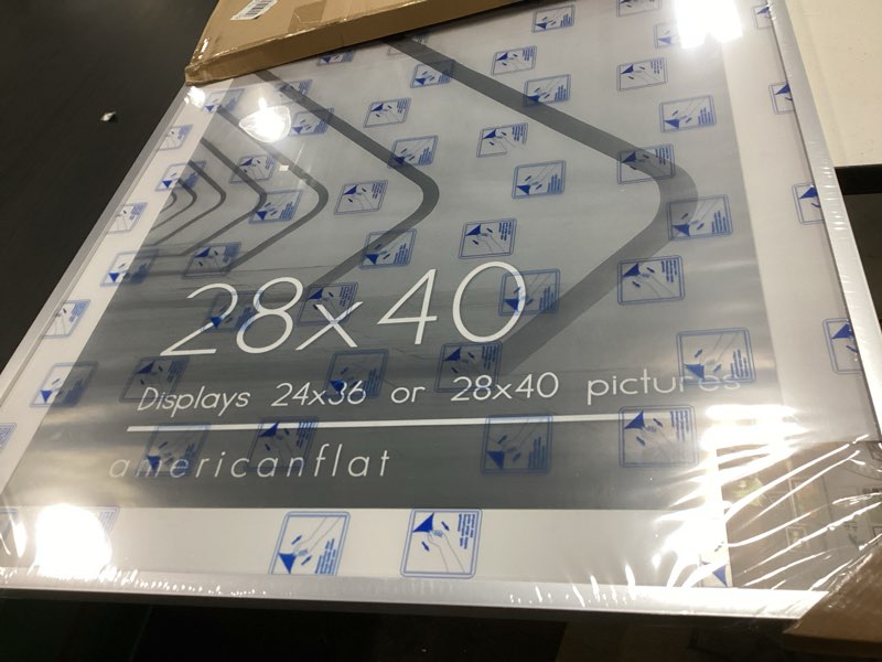 Condition photo showing Good Condition for americanflat 28x40 poster frame with polished plexiglass - use as 24x36 frame with mat or display 28x40 photo without mat - streamline collection - thin border picture frames for wall - silver silver 28x40 1 pack