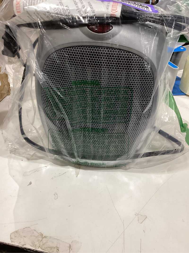 Condition photo showing New/Like New for Amazon Basics Ceramic Space Heater, Portable Indoor Heating Solution, With Overheat and Tip-Over Protection, Thermostat, Non-Oscillating, 1500W, 7.52"D x 6.34"W x 9.45"H, Silver Non-oscillating silver