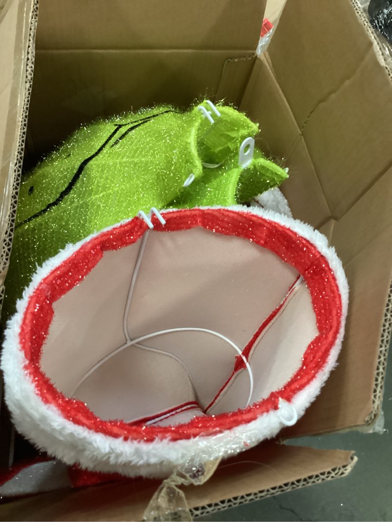 Condition photo showing As Is for Grinch 7-Ft Freestanding Yard decoration with White LED Lights in