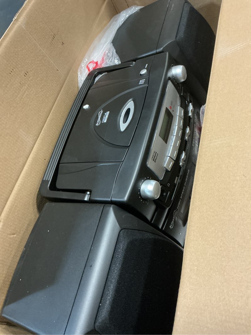 Condition photo showing Good Condition for supersonic black edition vintage bluetooth stereo system home music audio system,cd/mp3 player,am/fm radio,dual cassette player/rec usb inputs,detachable speakers,ac/dc,(remote included)matte black