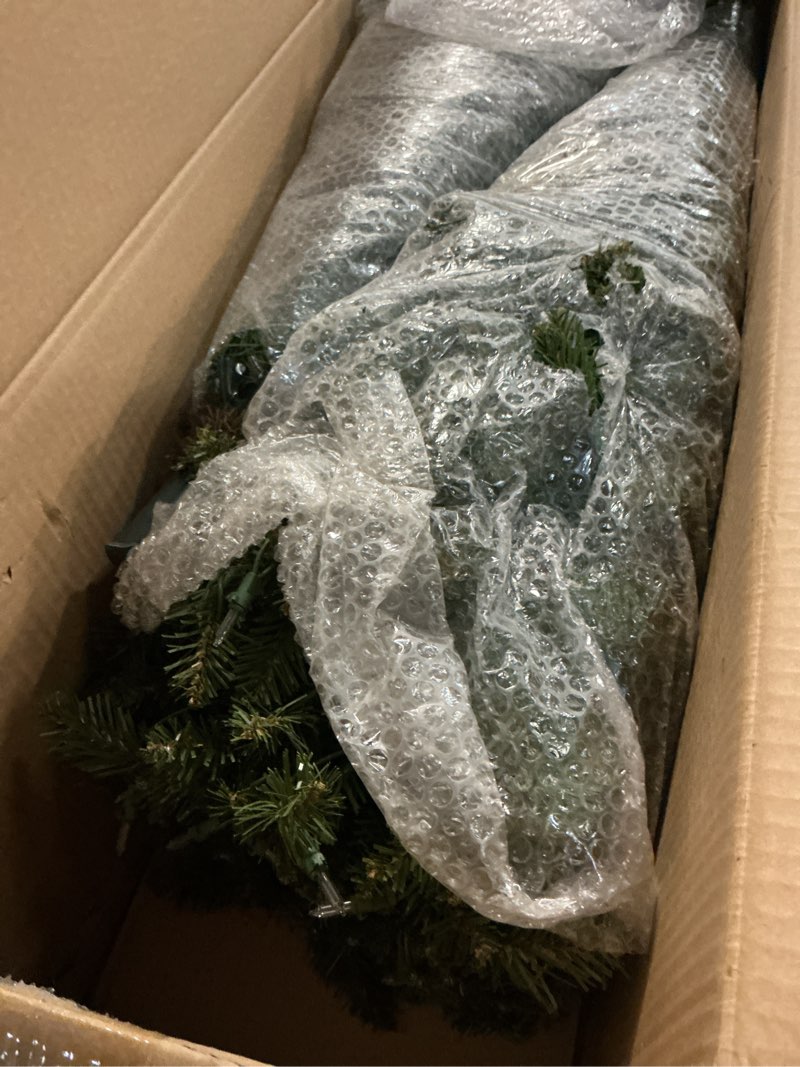 Condition photo showing Good Condition for Puleo International 6.5 Foot Pre-Lit Slim Fraser Fir Artificial Christmas Tree with 350 UL Listed Clear Lights, Green 6.5' Slim Fraser Fir with 350 Clear Lights