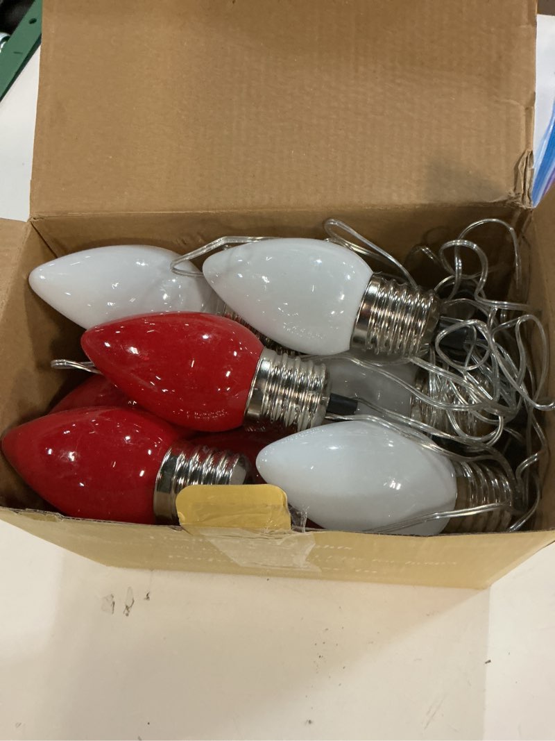 Condition photo showing As Is for 12 Pack Large C9 Christmas Decorations Outdoor Waterproof, Solar C9 Christmas Lights Outdoor with 2 Modes, Solar Pathway Light for Outside Party Yard Lawn Patio Walkway Xmas Decoration (Red and White) Red and White 12 Pack Solar Powered