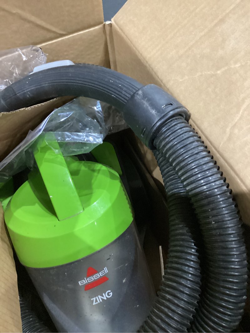 Condition photo showing As Is for bissell 2156a zing canister bagless vacuum zing canister lime