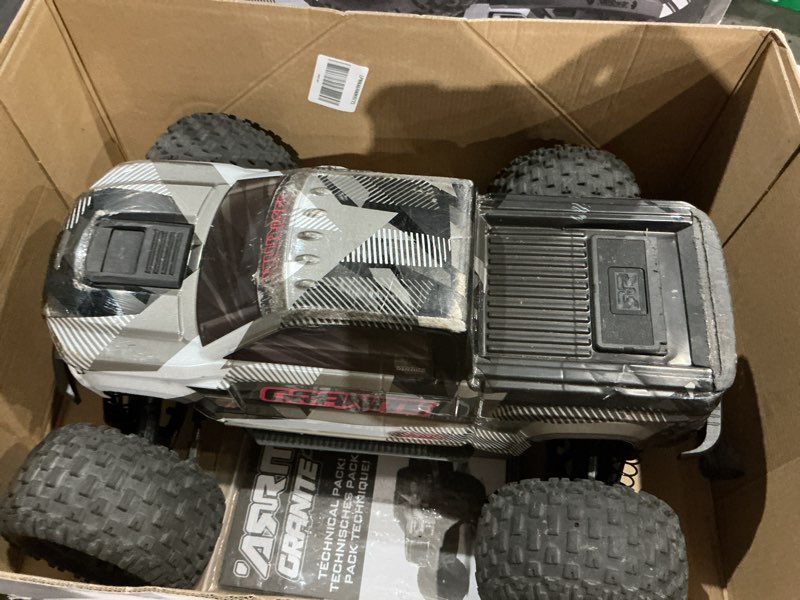 Condition photo showing As Is for arrma rc truck 1/10 granite 4x4 223s blx brushless monster truck rtr with dsc, gun metal, ara4302v4t3