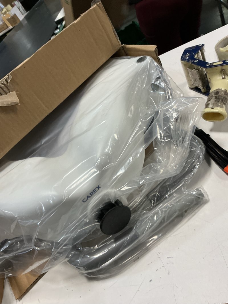 Condition photo showing Good Condition for Carex E-Z Lock Raised Toilet Seat with Handles - 4.5 Inch Toilet Seat Riser with Arms, Toilet Riser Fits Most Toilets, Elongated or Round, Toilet Seat Lifter, White
