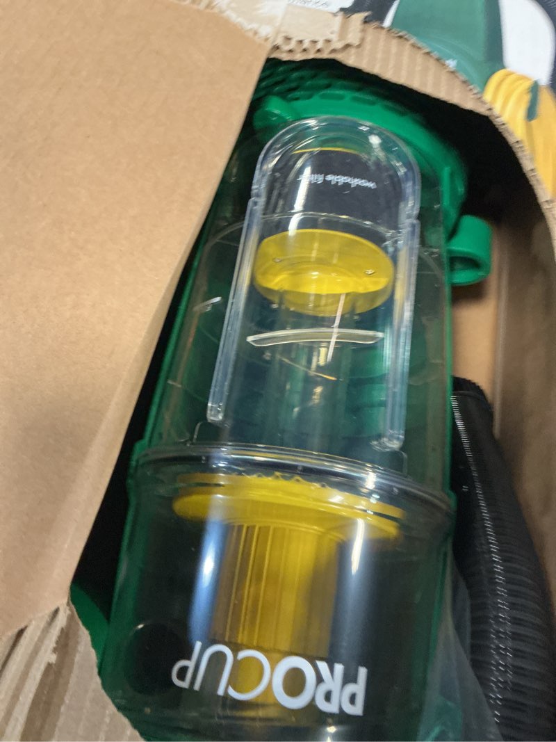 Condition photo showing As Is for bissell biggreen bgu1937t 13.5" pro cup bagless upright vacuum with on-board tools, 44" height, 13.5" wide, 13.2" length, polypropylene, 2 fl. oz. capacity, green