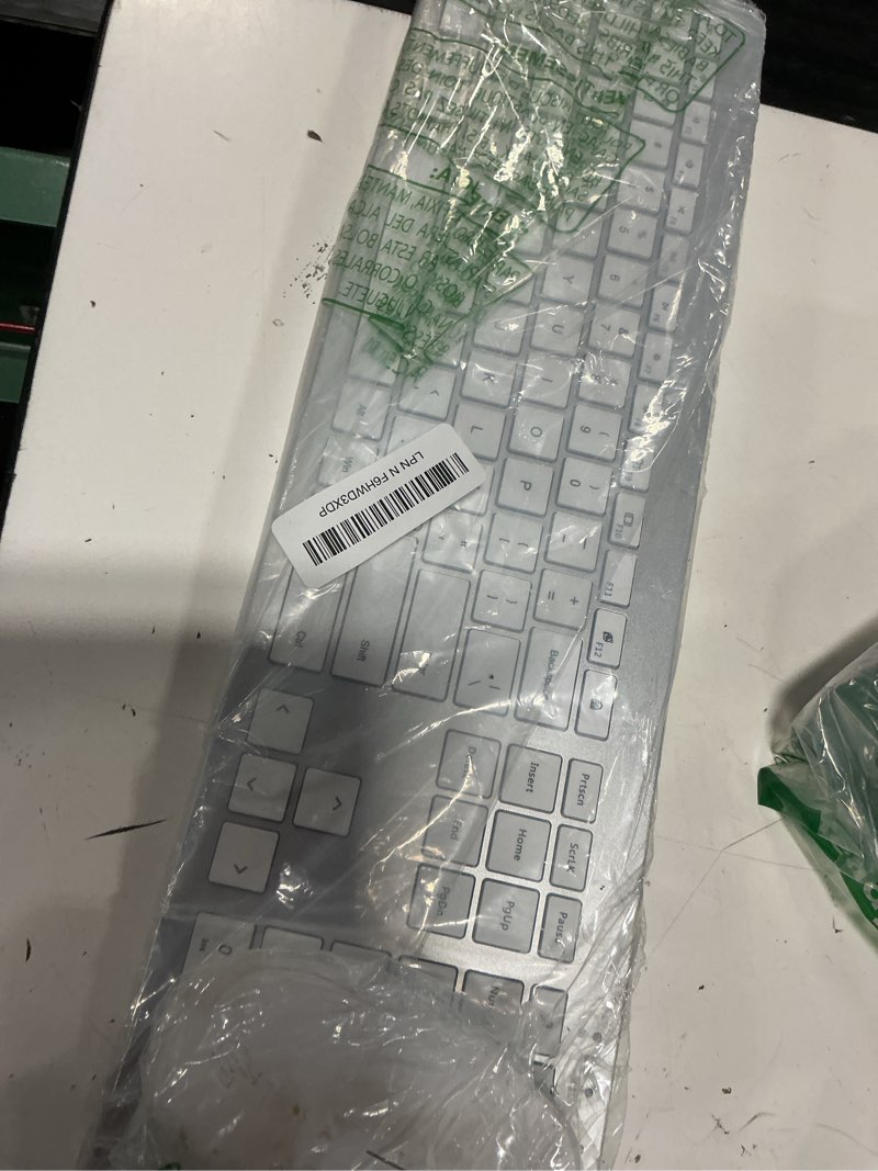 Condition photo showing As Is for wireless keyboard and mouse combo - full size slim thin wireless keyboard mouse with numeric keypad 2.4g stable connection adjustable dpi (white & silver) silver and white