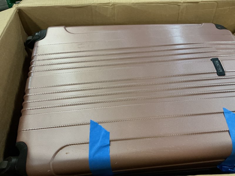 Condition photo showing As Is for kenneth cole reaction out of bounds lightweight hardshell 4-wheel spinner luggage, rose gold, 28-inch checked 28-inch checked rose gold