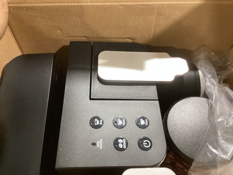 Condition photo showing Good Condition for Cuisinart Single-Serve Coffee Maker + Coffee Grinder with 8, 10, and 12 oz. Serving Size, Compatible with Single-Cup Pods, 48-Ounce Removable Reservoir, Stainless Steel, DGB-2SS