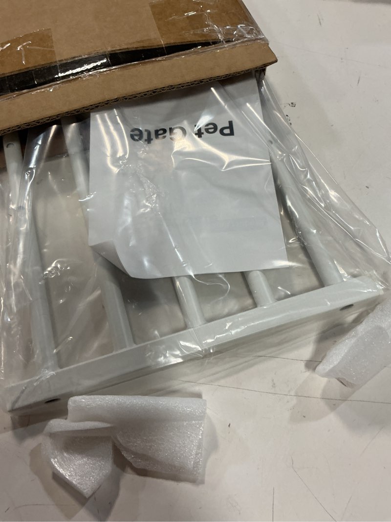 Condition photo showing Good Condition for Malier Dog Gate with a Small Door, Extra Wide All Metal Short Dog Gate Pet Gate for Stairs, 10'' Tall Pressure Mount Easy Step Over Puppy Gate Low Gate for Doorways White 10''H × 26''- 41''W