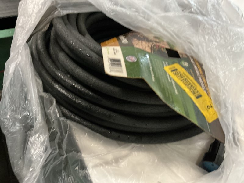 Condition photo showing As Is for element soaker 3/8" x 75' garden hose