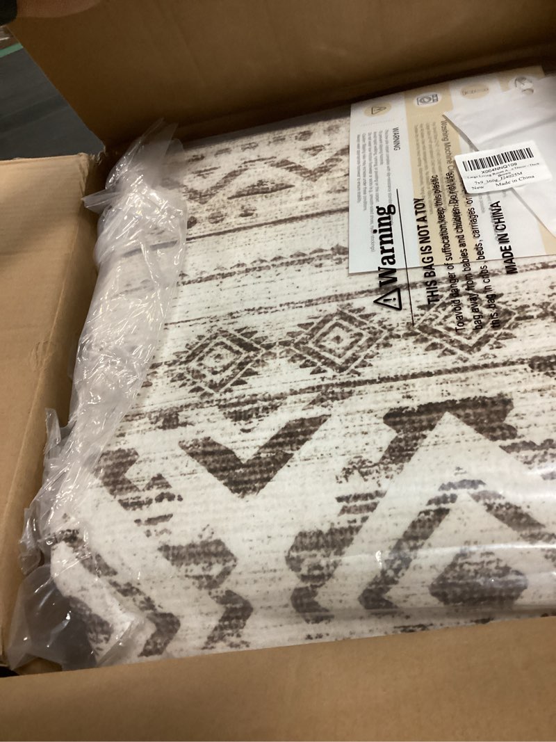 Condition photo showing New/Like New for 7x9 area rug living room: washable boho rugs with non slip backing large soft indoor stain resistant carpet for bedroom farmhouse dining room lightweight home decor dark brown dark brown 7' x 9' (rectangular)