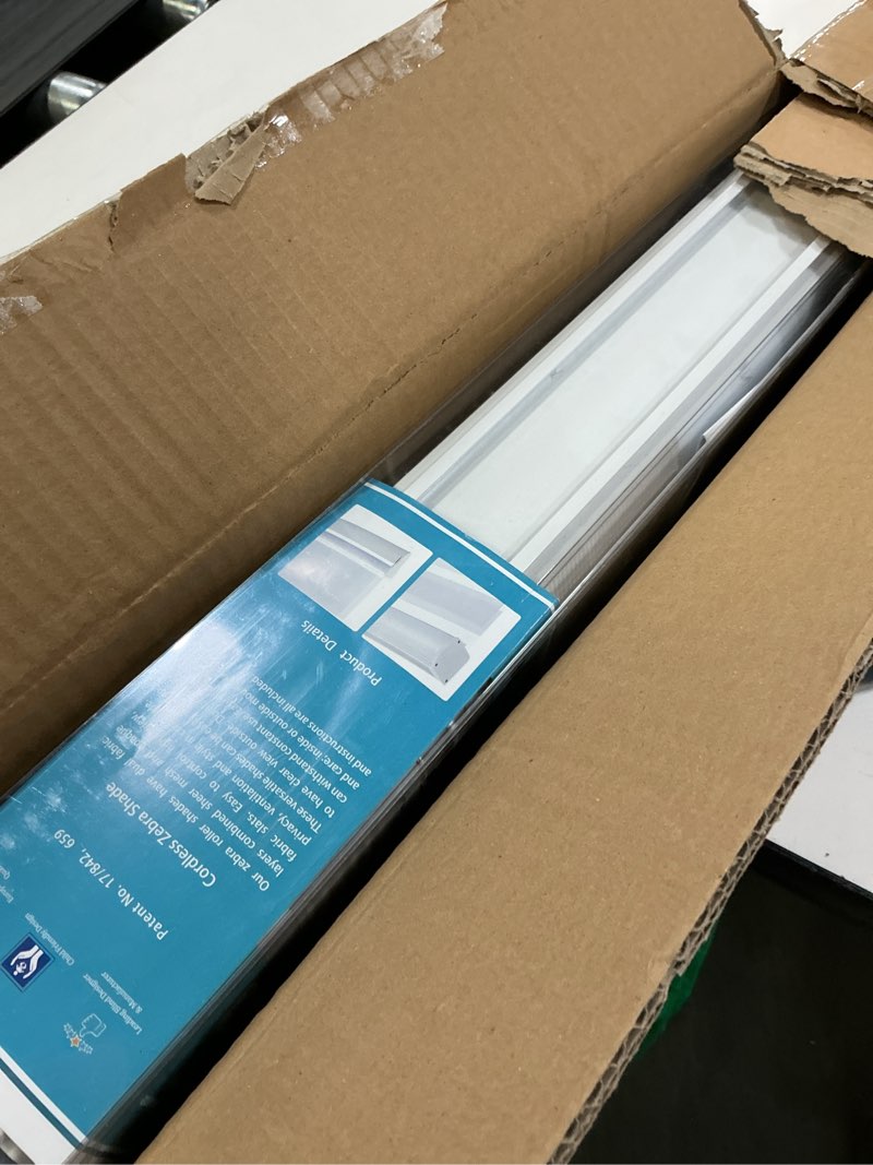 Condition photo showing Good Condition for MYshade Roller Shades Zebra Blinds for Indoor Windows Cordless Day and Night Light Filtering Dual Layer Roller Window Blinds & Shades, Easy to Install, Size 45" W x 72" H, White White 45"W x 72"H