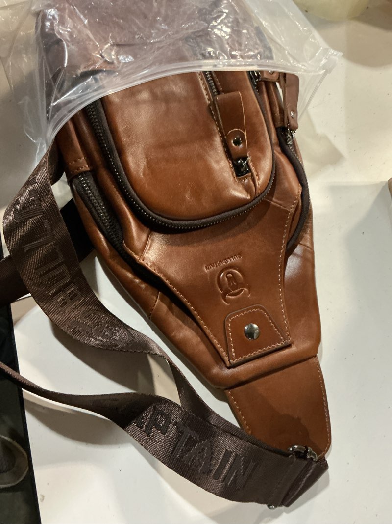 Condition photo showing Good Condition for bullcaptain genuine leather sling bag with usb charging port multi-pocket chest bag for men hiking travel daypack xb-129 brown