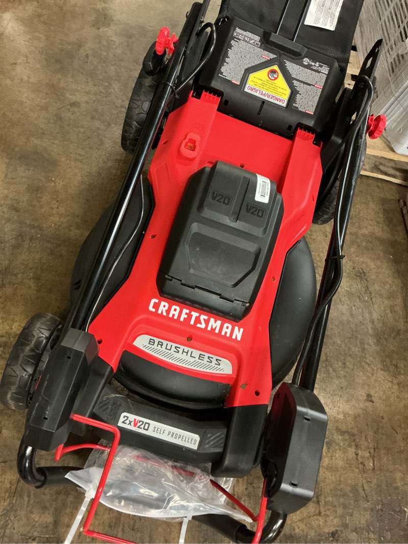 Condition photo showing As Is for craftsman v20 20-volt, 20-in self propelled battery walk mower with (2) 5 ah battery included