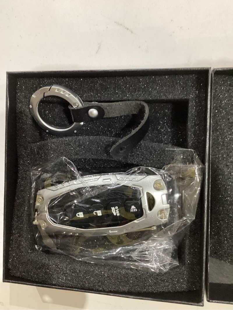 Condition photo showing New/Like New for heavy duty key fob cover for nissan altima maxima rogue armada pathfinder zinc alloy keyless entry remote control car key case protector with keychain 4 button (silver) model-a-silver